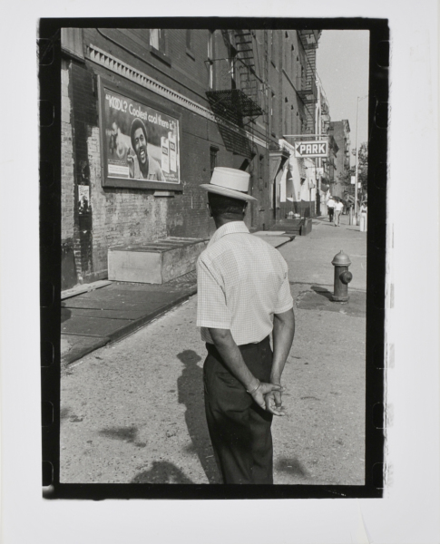 MAN WITH HAT AND KOOL ADVERTISEMENT, NEW YORK