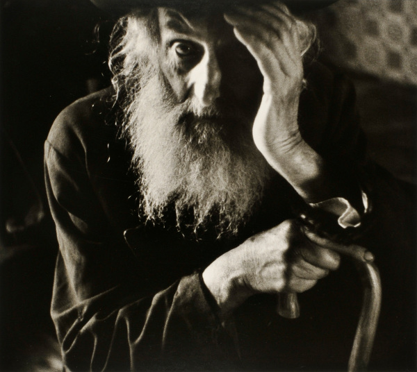 AT THE OPEN FIRE, CARPATHIAN RUTHENIA