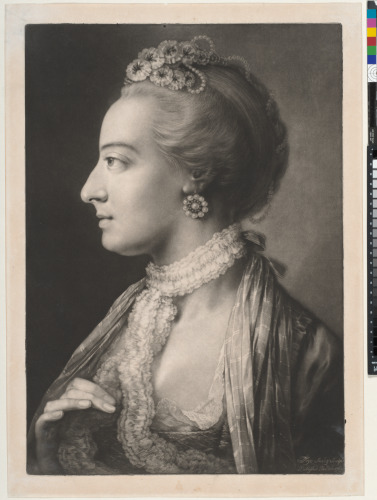 YOUNG WOMAN IN PROFILE TO THE LEFT