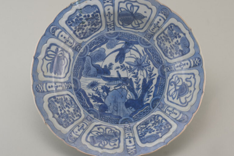 Large Dish Decorated with a Grasshopper on a Rock