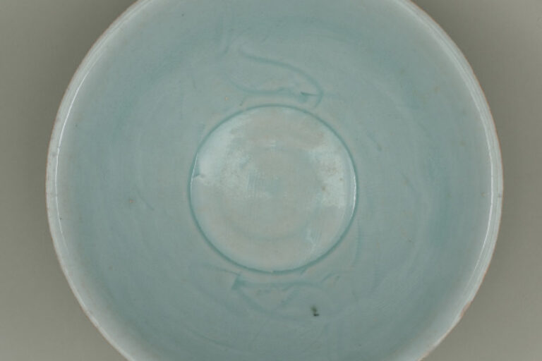 Deep Bowl with Carved Fish Design