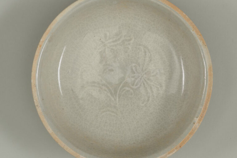 Dish with Applied Floral Design and Unglazed Rim
