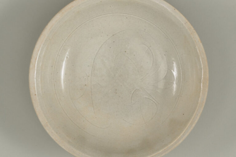 Dish with Incised Design and Carved Upright Petals Around Exterior