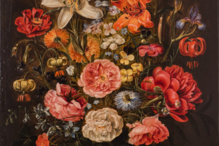 A STILL LIFE OF LILIES, ROSES, IRIS, PANSIES, COLUMBINE, LOVE-IN-A-MIST, LARKSPUR AND OTHER FLOWERS IN A GLASS VASE ON A TABLE TOP, FLANKED BY A ROSE AND A CARNATION