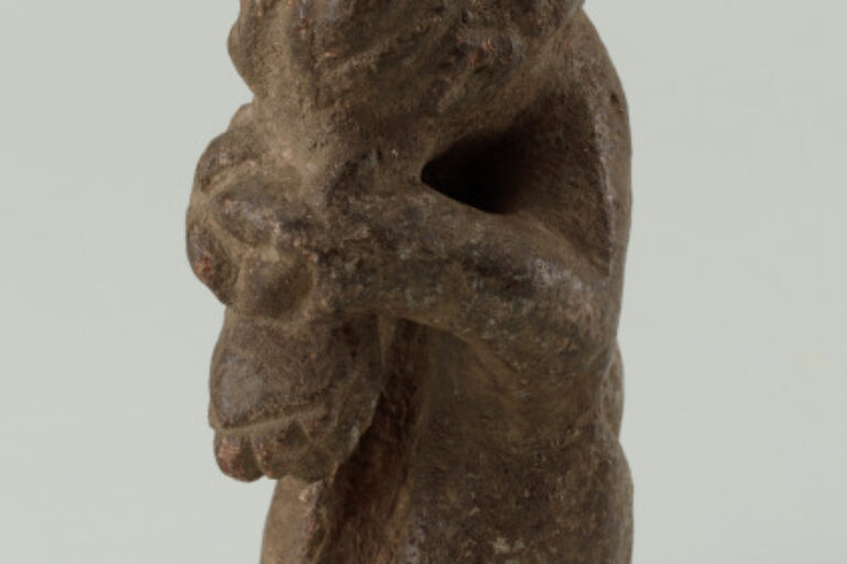 Figure of a Crocodile Holding its Snout