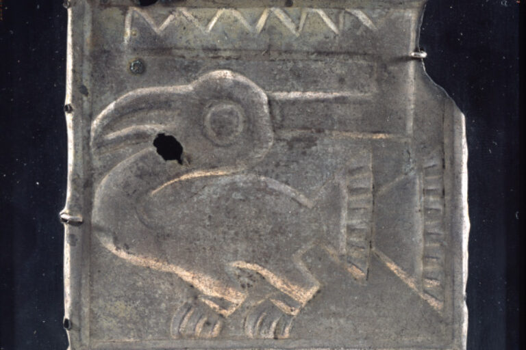 Plaque depicting a bird