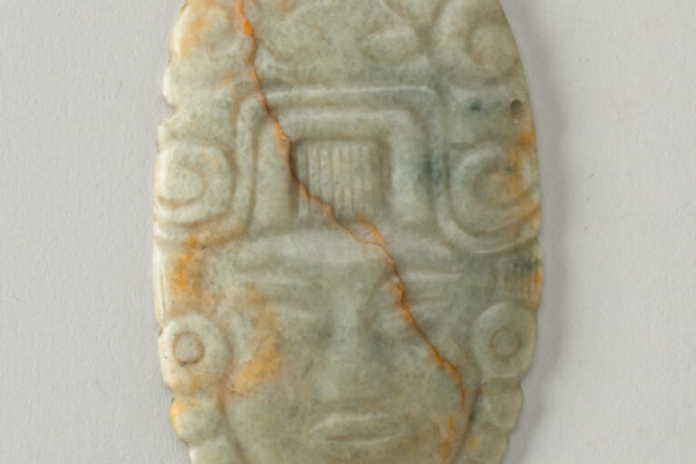 Pendant with face