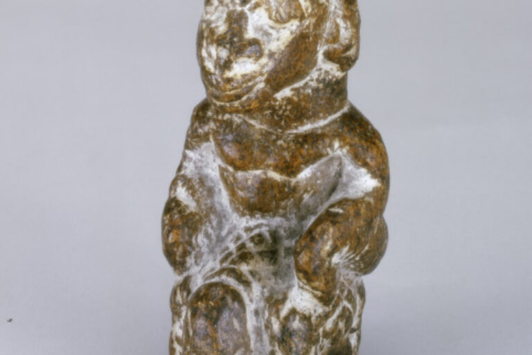 Male Figure Riding an Elephant