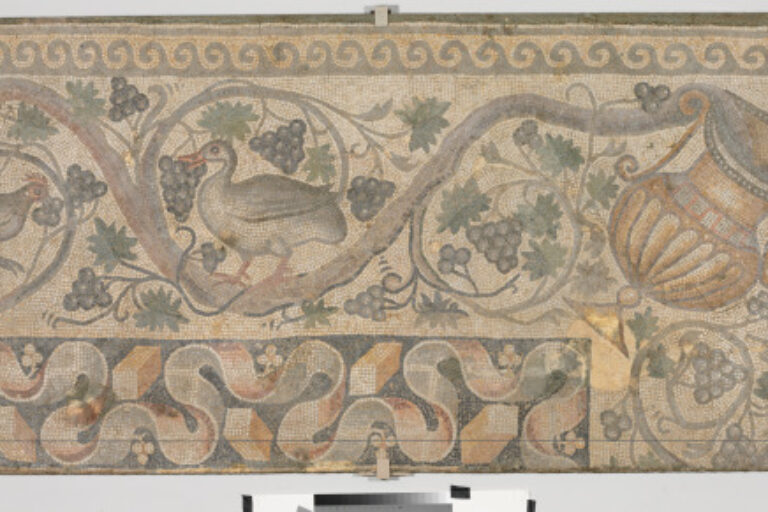 Fragment of floor mosaic depicting a scrolling vine and birds