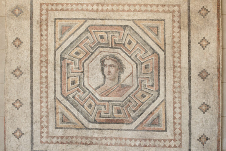 Fragment of floor mosaic depicting a male figure