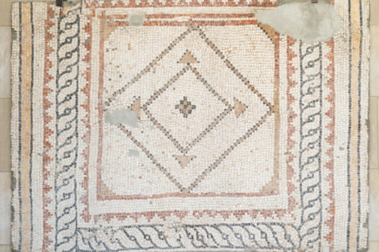 Fragment of floor mosaic depicting geometric designs