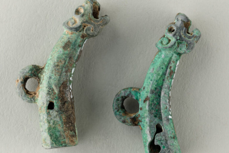 Two Dragon-Headed Fittings