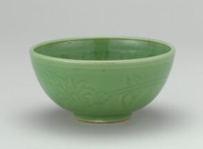 Bowl with Molded Decoration of Figures and Inscriptions