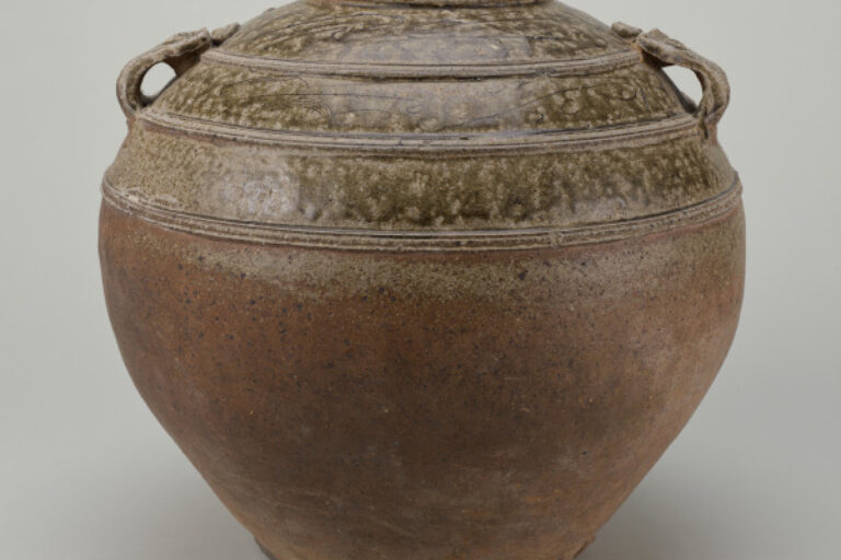 Storage Vessel with Incised Scroll Design and Mask Handles