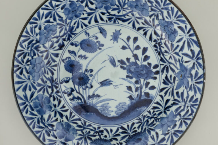 Large Platter Decorated with a Scene of Grasshoppers in a Garden
