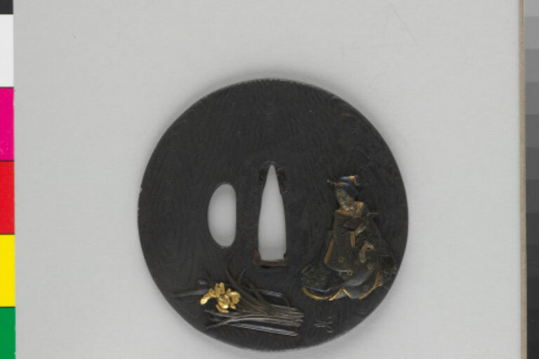 SWORD GUARD DECORATED WITH SEATED WOMAN AND CUT IRISES
