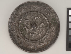 Mirror Decorated with Lion-and-Grape Motif