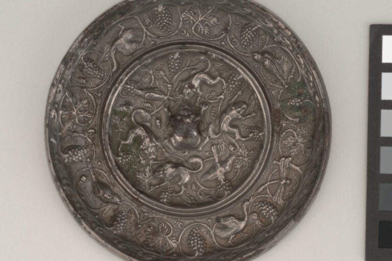 Mirror Decorated with Lion-and-Grape Motif