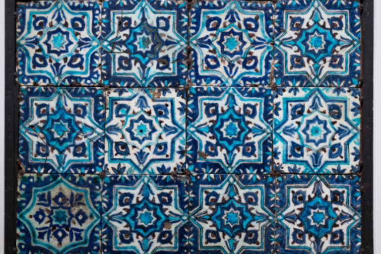 Panel of Twelve Star-and-Cross Pattern Tiles Decorated with Floral Star Motifs