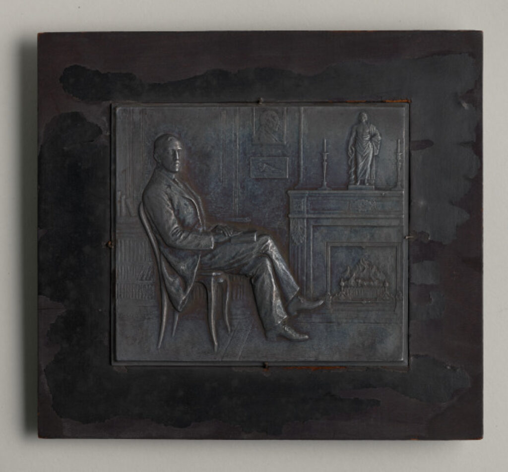 “Scene of a Man Seated Before a Fireplace” Plaquette