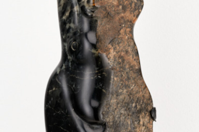 Female Form Embedded in Stone