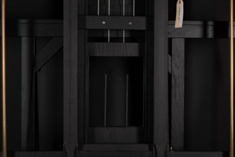 INTERIOR WITH WOMAN AT PIANO