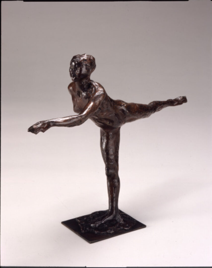 ARABESQUE OVER THE RIGHT LEG, LEFT ARM IN FRONT