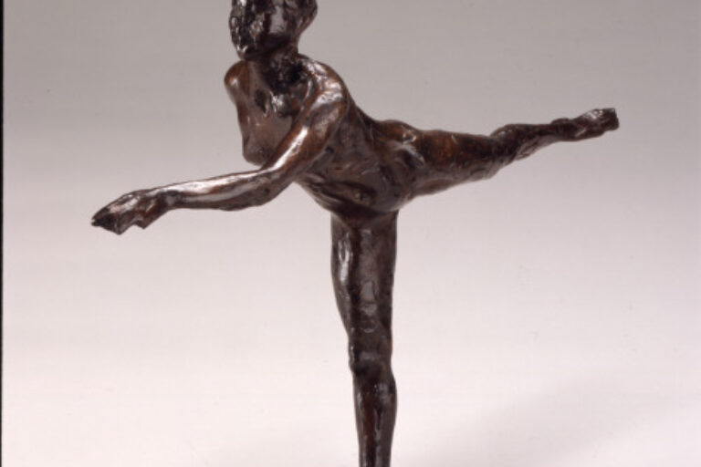 ARABESQUE OVER THE RIGHT LEG, LEFT ARM IN FRONT