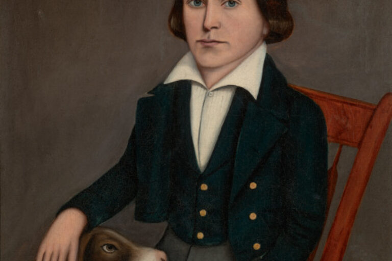 Boy in Red Chair with Dog