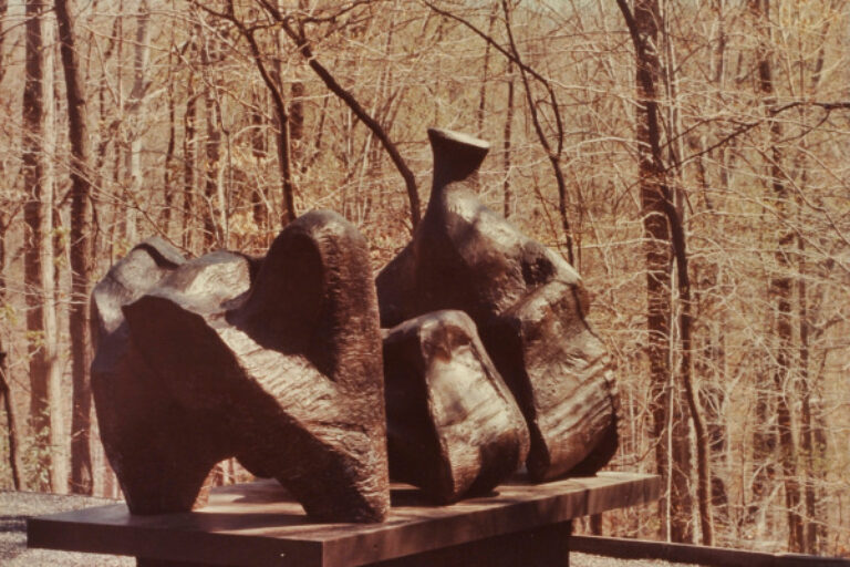 MENRI MOORE, THREE PIECE RECLINING FIGURE. PHOTOGRAPH TAKEN IN THE WURTZBURGER SCULPTURE GARDEN (ORIGINAL SITE, TIMBERLANE)