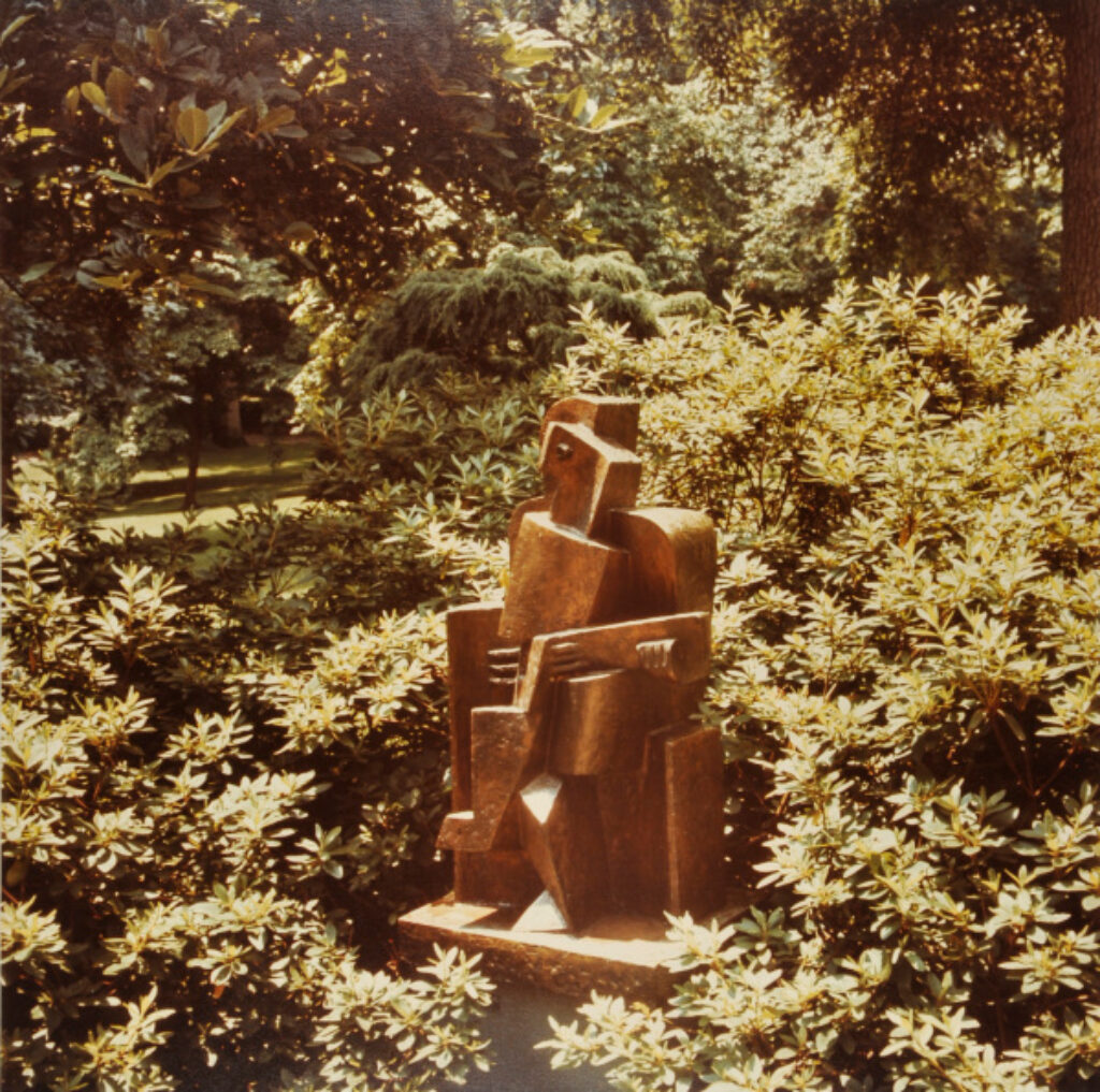 Lipchitz, Seated Guitar Player. Photograph taken in The Wurtzburger Sculpture Garden (original site, Timberlane)