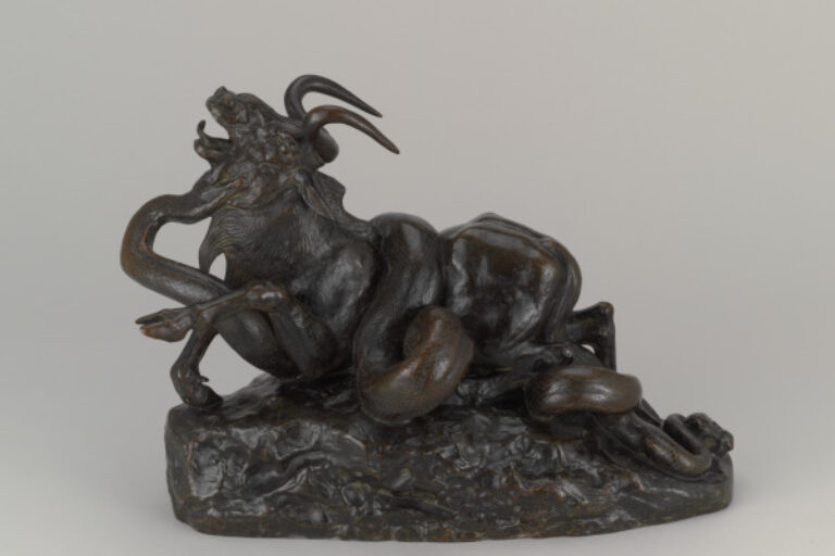 PYTHON SEIZING A GNU BY THE THROAT