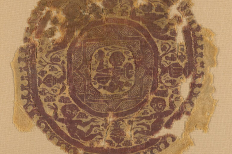 FRAGMENT OF ROUNDEL (ORBICULUS) WITH PYRRHIC DANCER AND NEREIDS