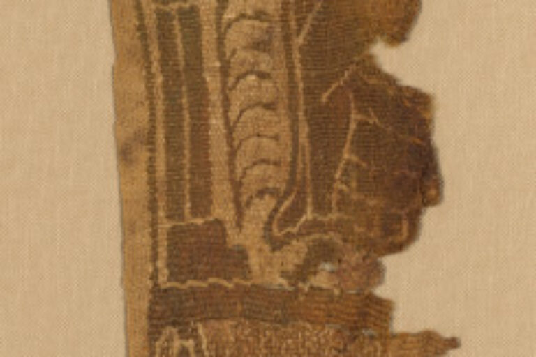 FRAGMENT OF TUNIC ORNAMENT WITH DANCING WOMAN (BACCHANTE) AND ANIMAL