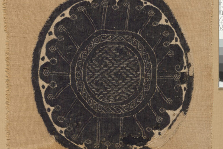 ROUNDEL (ORBICULUS) WITH FRET DESIGNS AND SCALLOPED BORDER