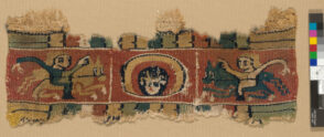 Fragment of Band or Clavus with Saint’s Head Flanked by Horsemen