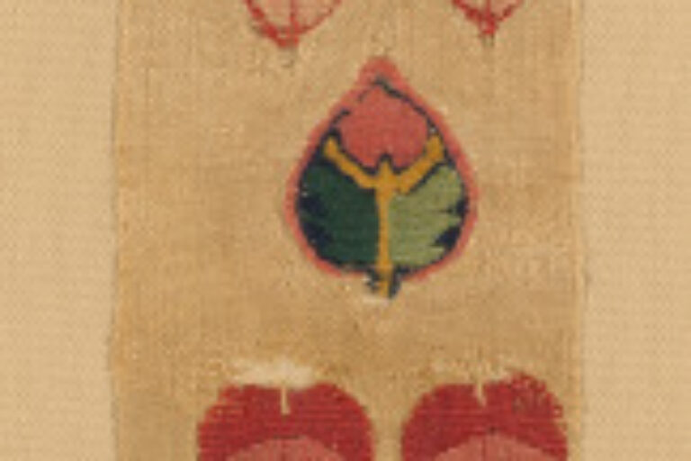 FRAGMENT OF DECORATIVE BAND OR CLAVUS WITH FLORAL DESIGNS