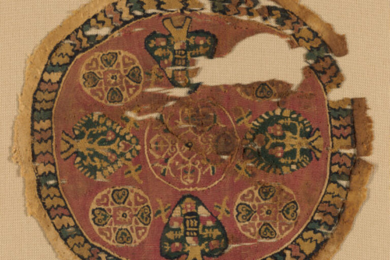 FRAGMENT OF ROUNDEL (ORBICULUS) WITH TREE OF LIFE MOTIFS