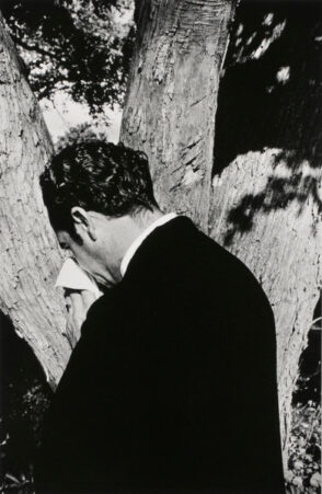 Man Blowing Nose