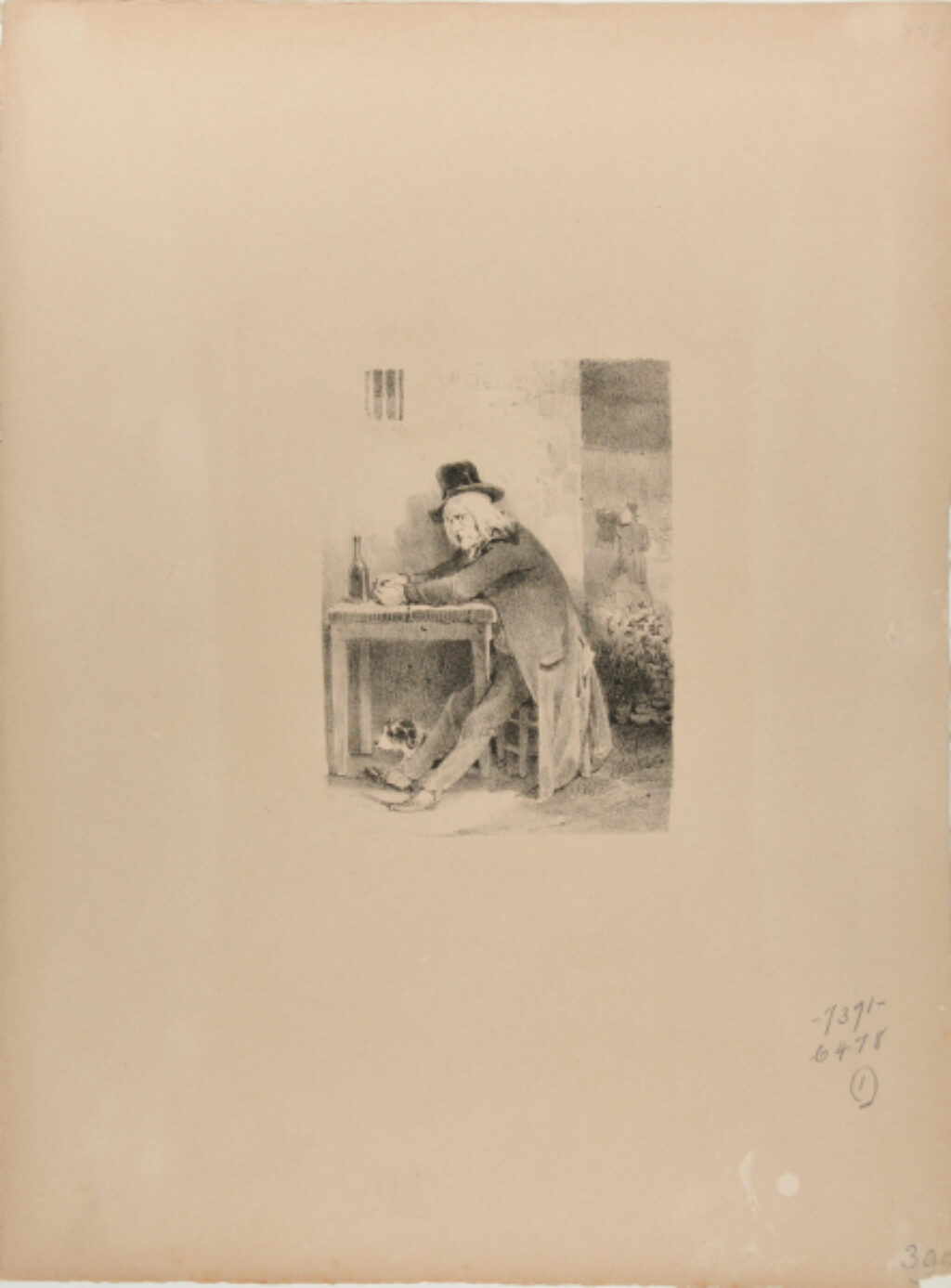 Homme assis devant une table