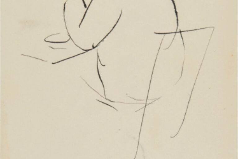 MAN SITTING AT TABLE