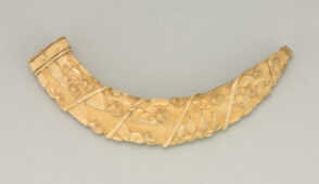 Tusk Carved in Relief