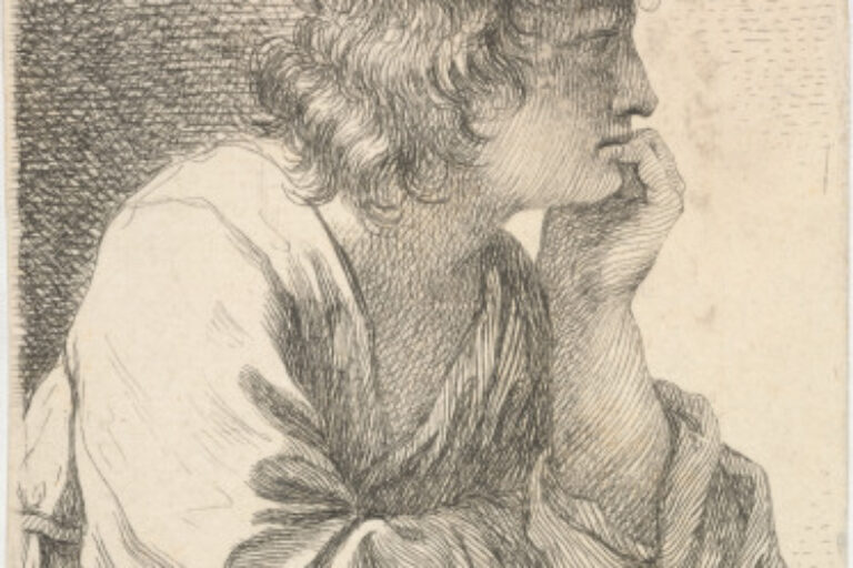 YOUNG MAN LEANING ON HIS HAND