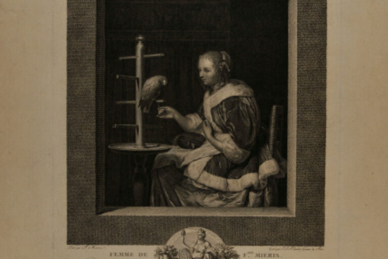 A YOUNG WOMAN FEEDING A PARROT