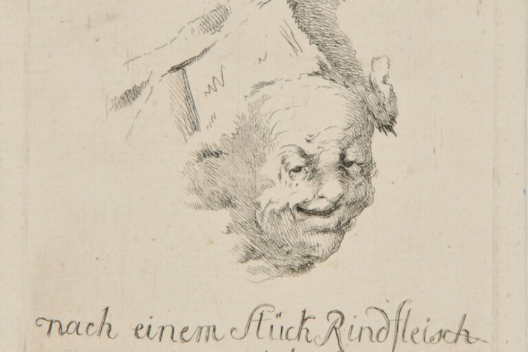 CARICATURE HEAD SKETCHED FROM A PIECE OF BEEF