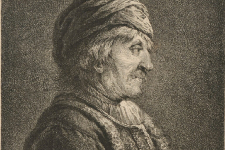 MAN WITH A CHAIN AND A MEDALLION IN A FUR-TRIMMED COAT