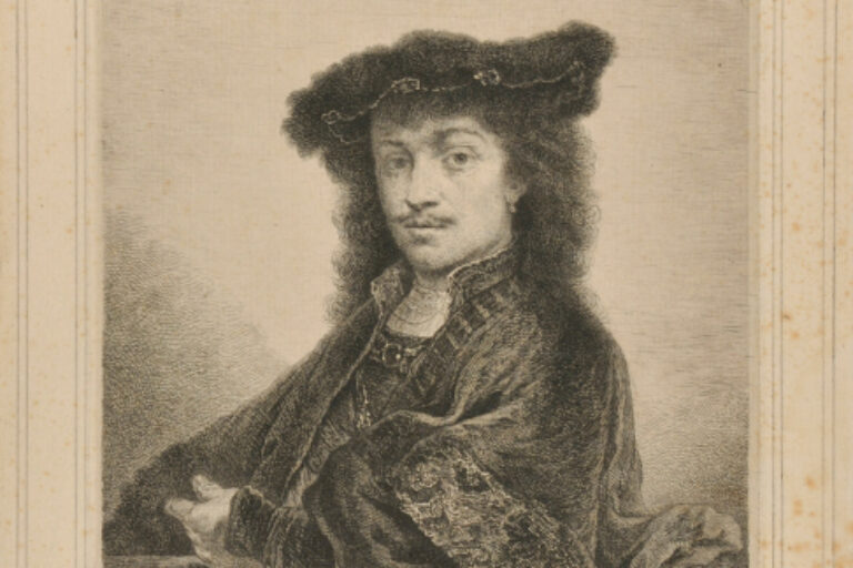 PORTRAIT OF A YOUNG MAN WEARING A FLAT CAP
