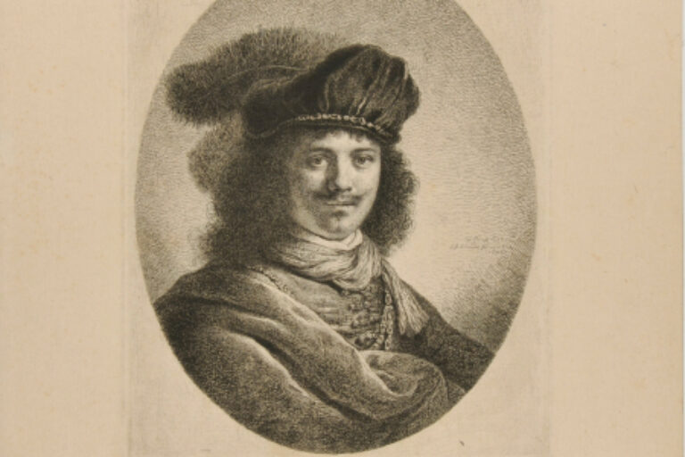 YOUNG MAN WEARING CAP WITH FEATHERS