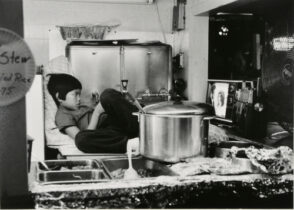 Boy in Kitchen Watching TV