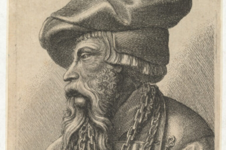 HALF-LENGTH OF BEARDED MAN WITH HEAVY CHAIN